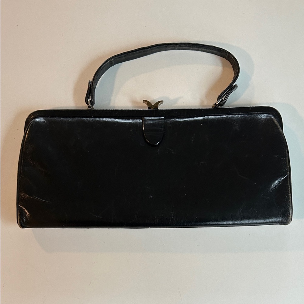 1950’s elegant black purse.  Timeless classic.